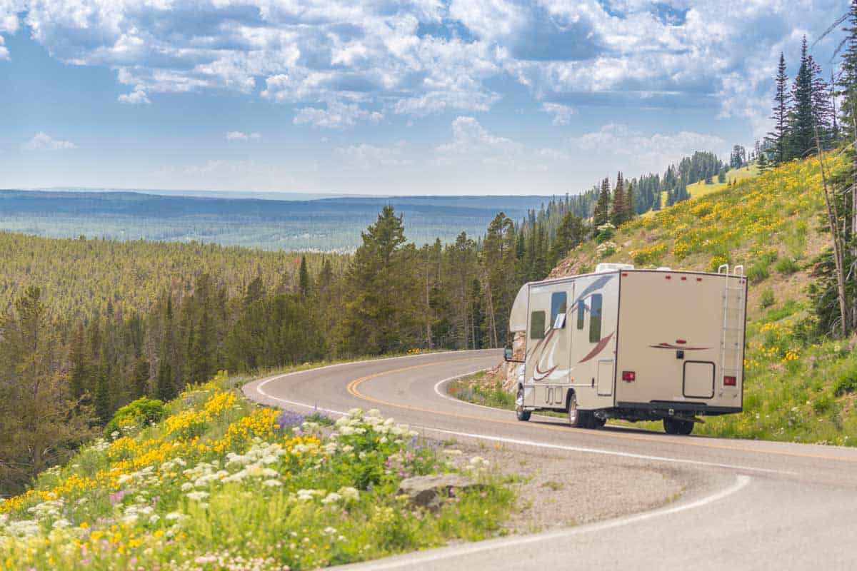 Class C motorhome driving on a road