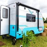 Riverside RV Retro 135 travel trailer RV silver with aqua exterior